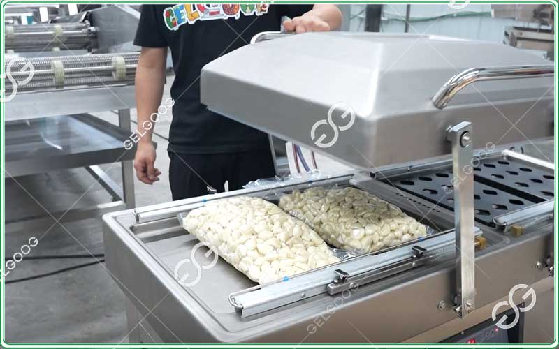 máquina envasadora al vacío de ajo pelado